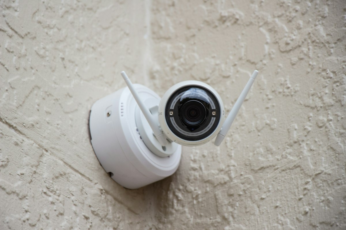 Surveillance camera on a wall