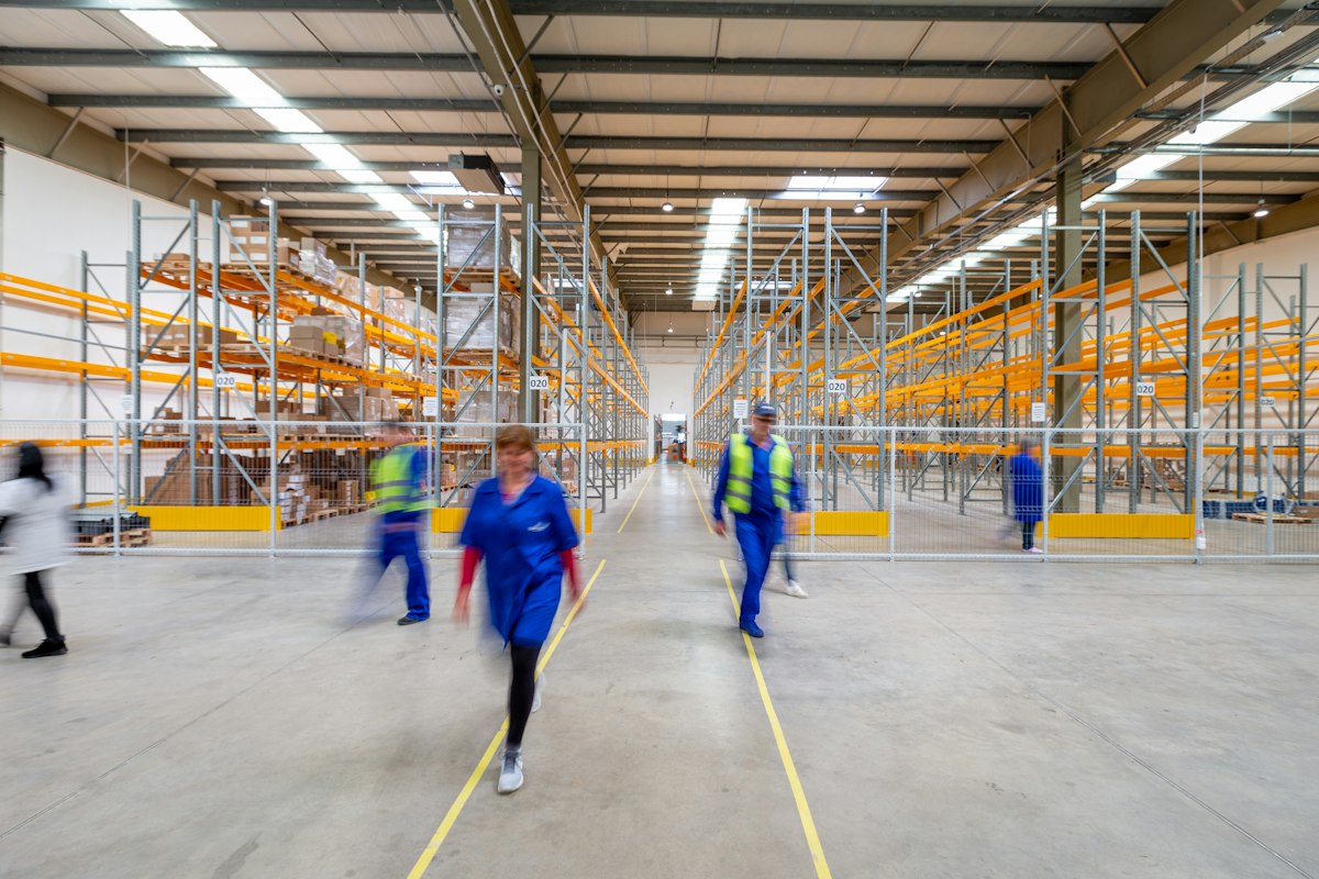 Warehouse aisle with stocked shelving